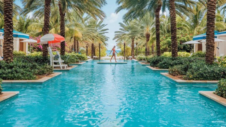 Grand-Hyatt-Baha-Mar-Bahamas-resort-woman-walking-across-pool.jpg