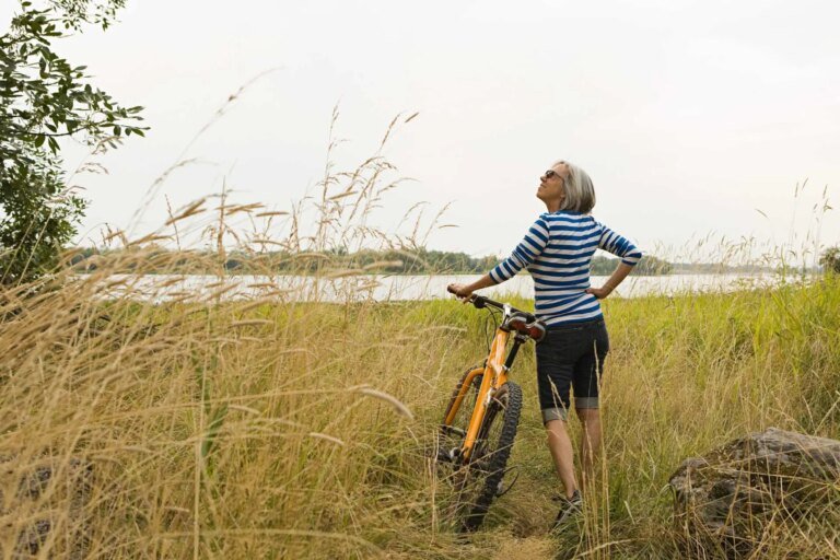 Mature-woman-introvert-traveler-with-bike-Image_Source_-istock.jpg