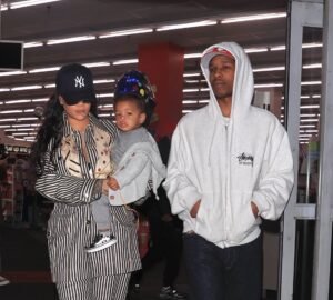 Rihanna-and-ASAP-Rocky-Shop-at-CVS-with-Riot-Rose-in-Striped-Bottega-Veneta-copy.jpg